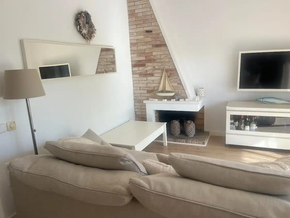 Sala de estar de Apartamento de alquiler en Sitges con Calefacción, Jardín privado y Terraza