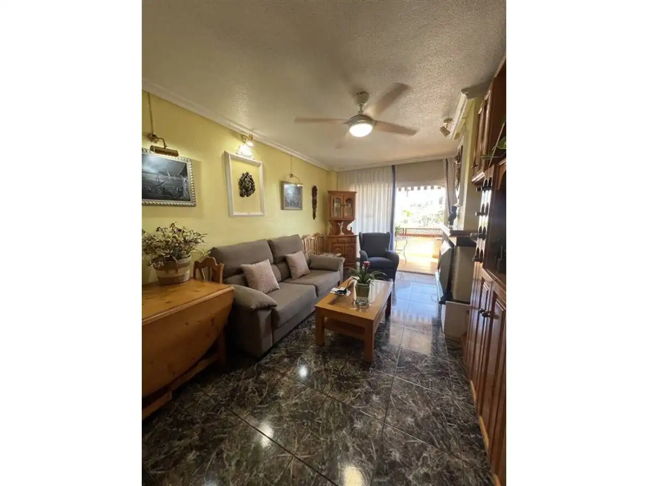 Sala de estar de Apartamento en venta en La Manga del Mar Menor con Aire acondicionado, Terraza y Piscina comunitaria