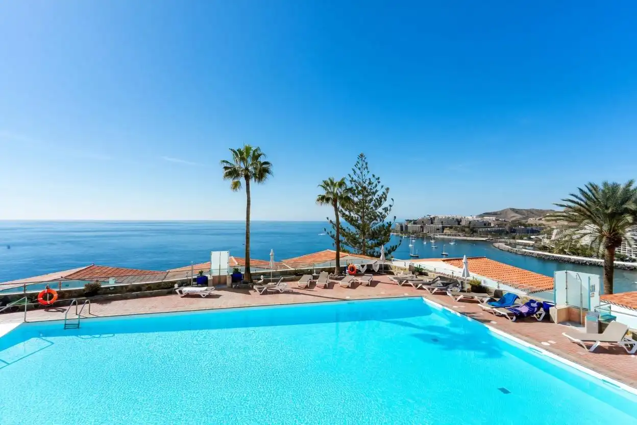 Piscina de Apartamento en venta en Mogán con Aire acondicionado, Jardín privado y Terraza