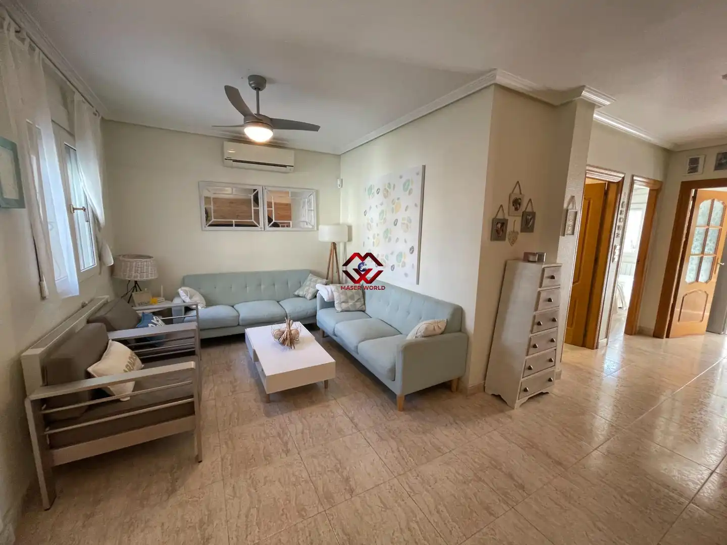 Sala d'estar de Casa adosada en venda en Pilar de la Horadada