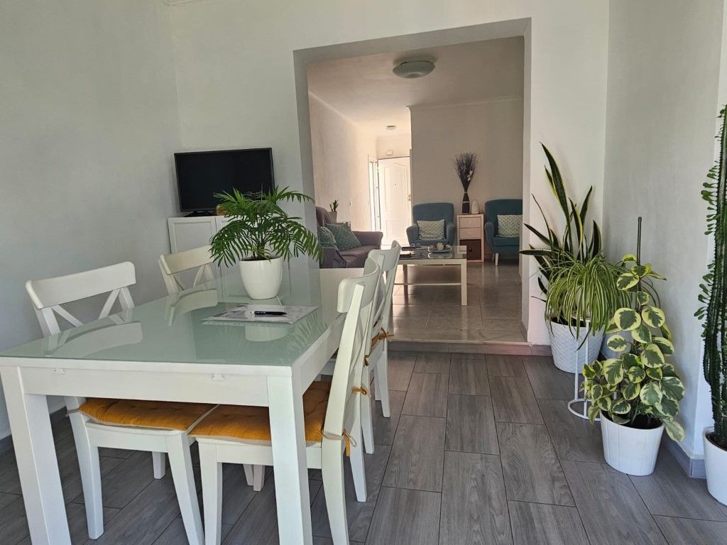 Dining room of Flat for sale in Torrox  with Air Conditioner, Private garden and Swimming Pool