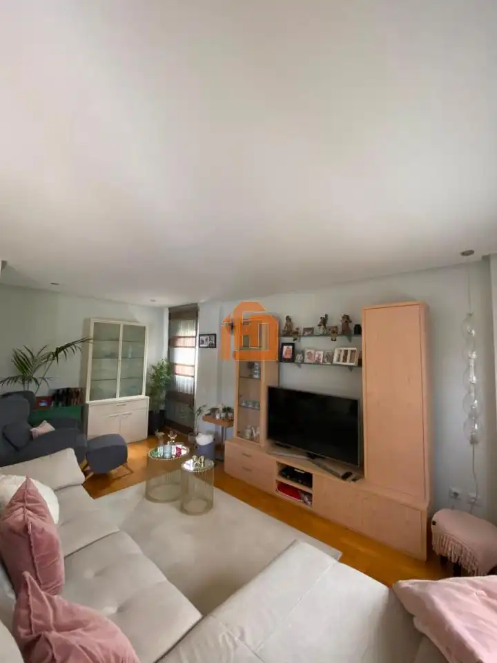 Sala de estar de Casa adosada en venta en San Andrés del Rabanedo con Calefacción, Jardín privado y Trastero
