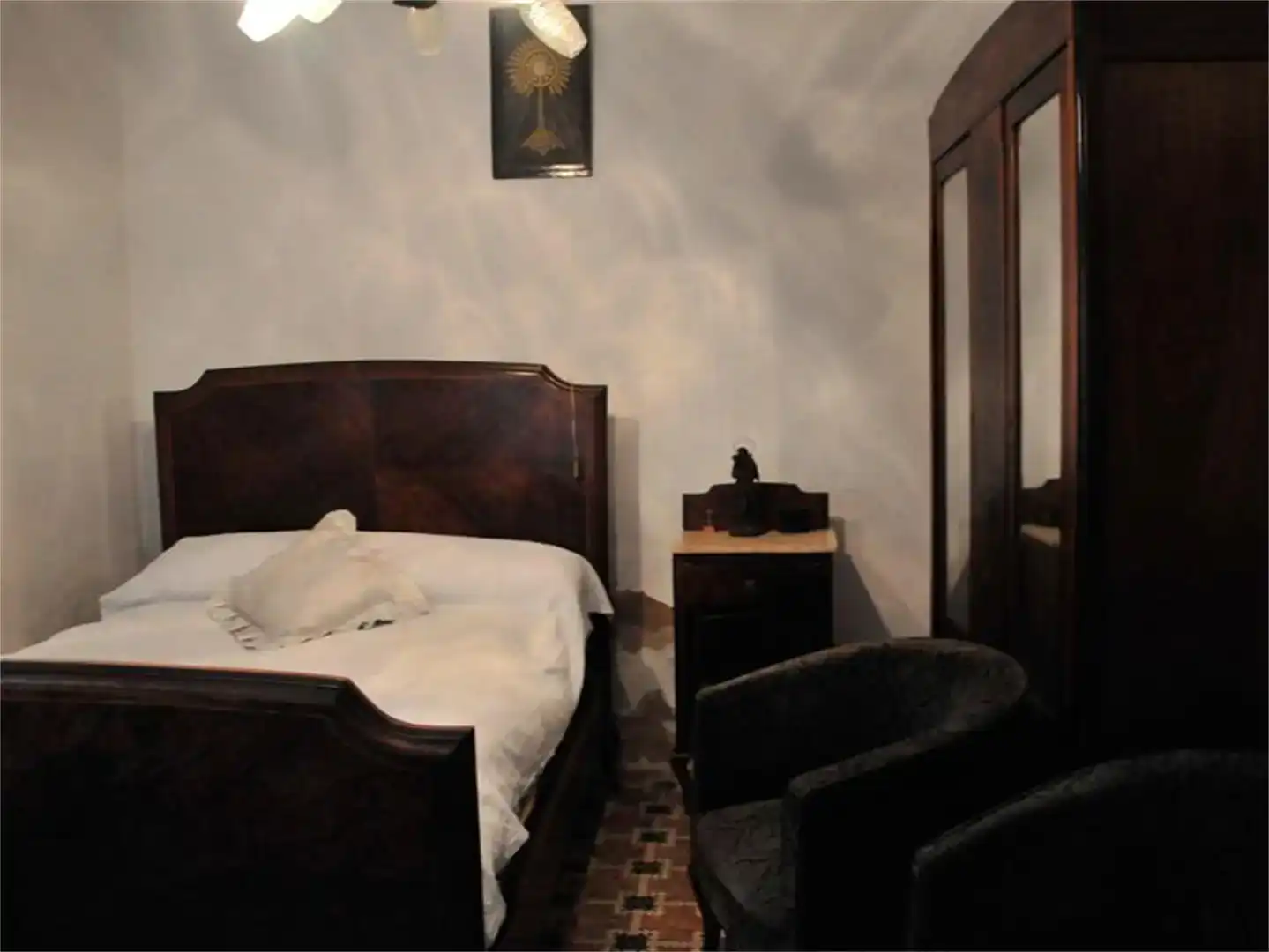 Habitación de Casa adosada en venta en Simat de la Valldigna con Jardín privado, Trastero y Amueblado