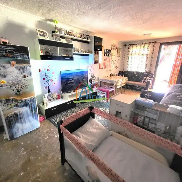 Sala d'estar de Casa adosada en venda en Almonte amb Aire condicionat, Calefacció i Terrassa
