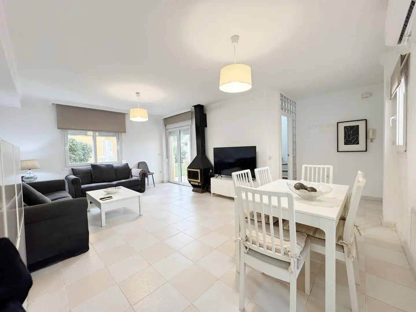 Sala de estar de Casa adosada en venta en Dénia con Aire acondicionado, Jardín privado y Terraza