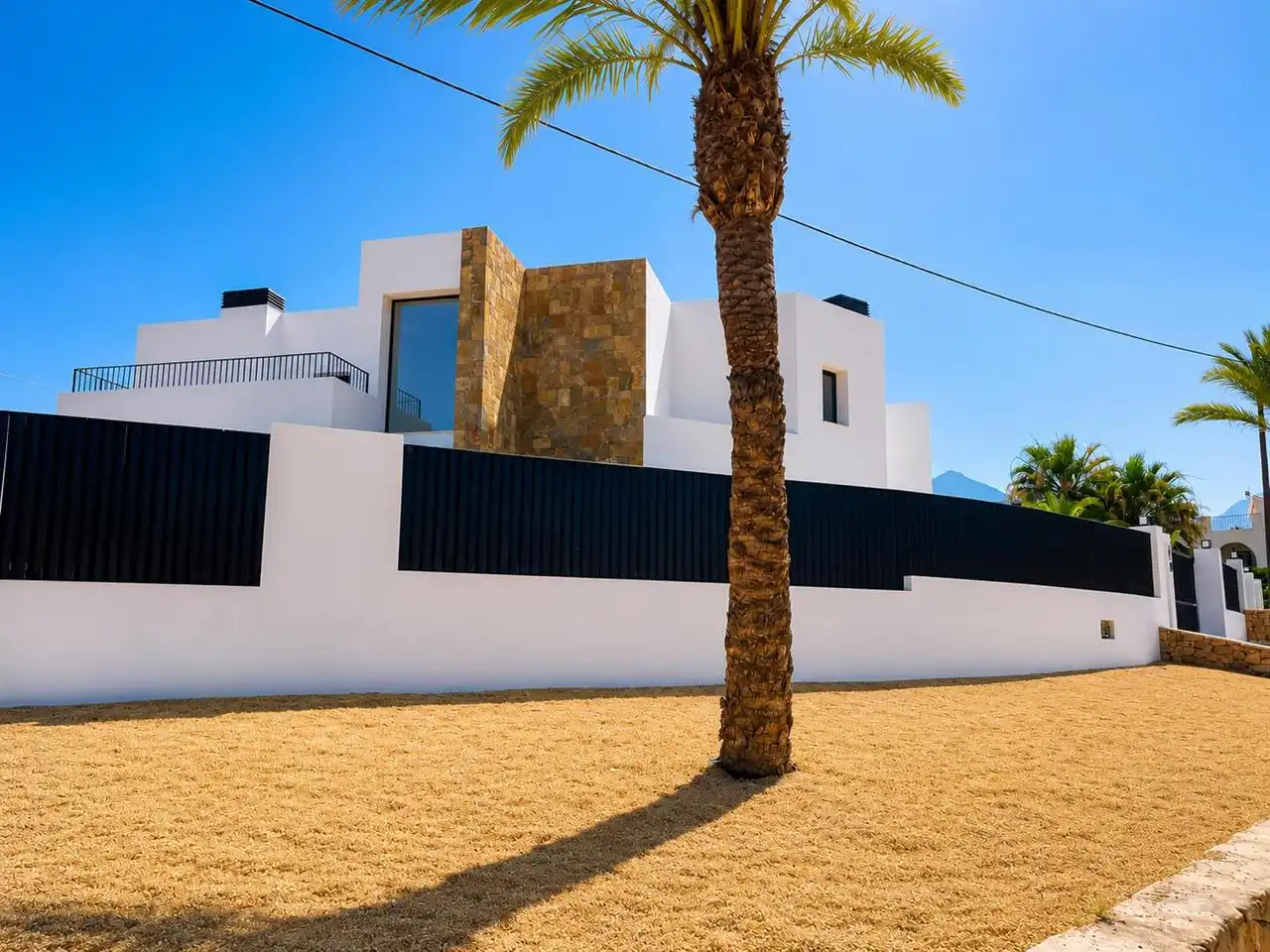 Vista exterior de Casa adosada en venda en L'Alfàs del Pi amb Aire condicionat, Jardí privat i Traster