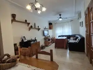 Sala de estar de Casa adosada en venta en Bormujos