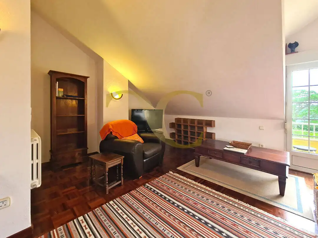 Sala de estar de Casa adosada en venta en Ribadesella con Calefacción, Trastero y Amueblado