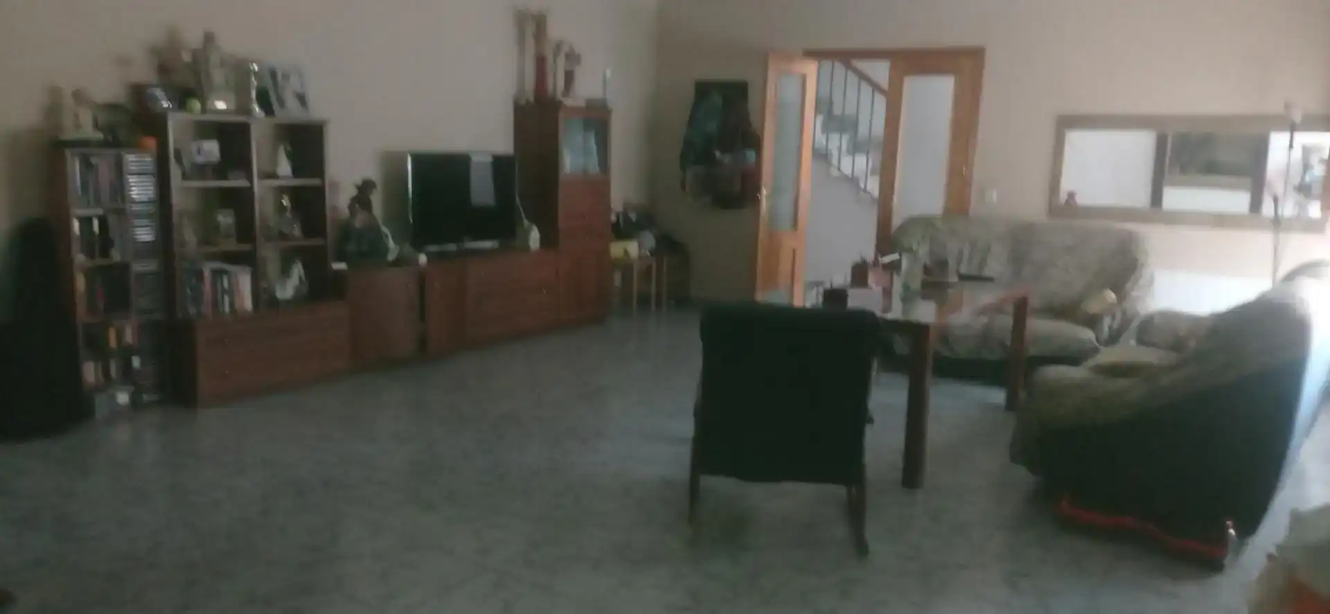 Sala de estar de Casa adosada en venta en Baza con Trastero y Balcón