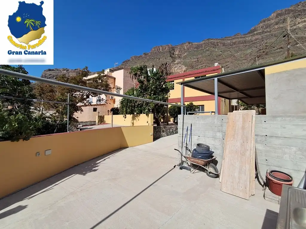 Außenansicht von Wohnung zum Verkauf in Mogán mit Privatgarten und Terrasse