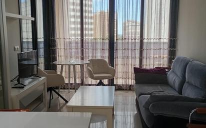Living room of Apartment for sale in Benidorm  with Air Conditioner, Private garden and Parquet flooring
