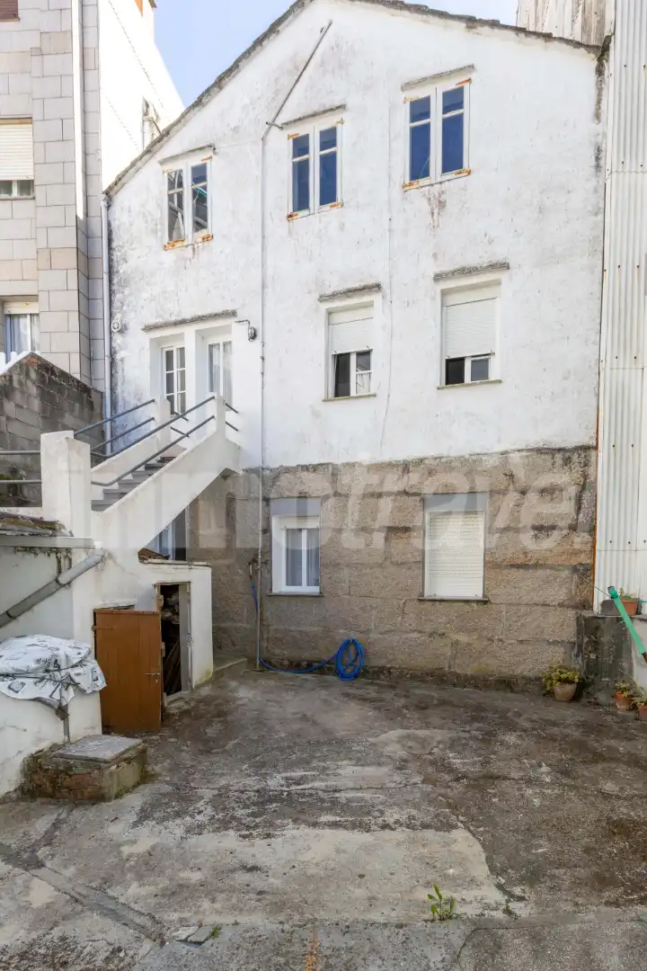 Vista exterior de Casa adosada en venda en Sanxenxo amb Terrassa, Moblat i Forn