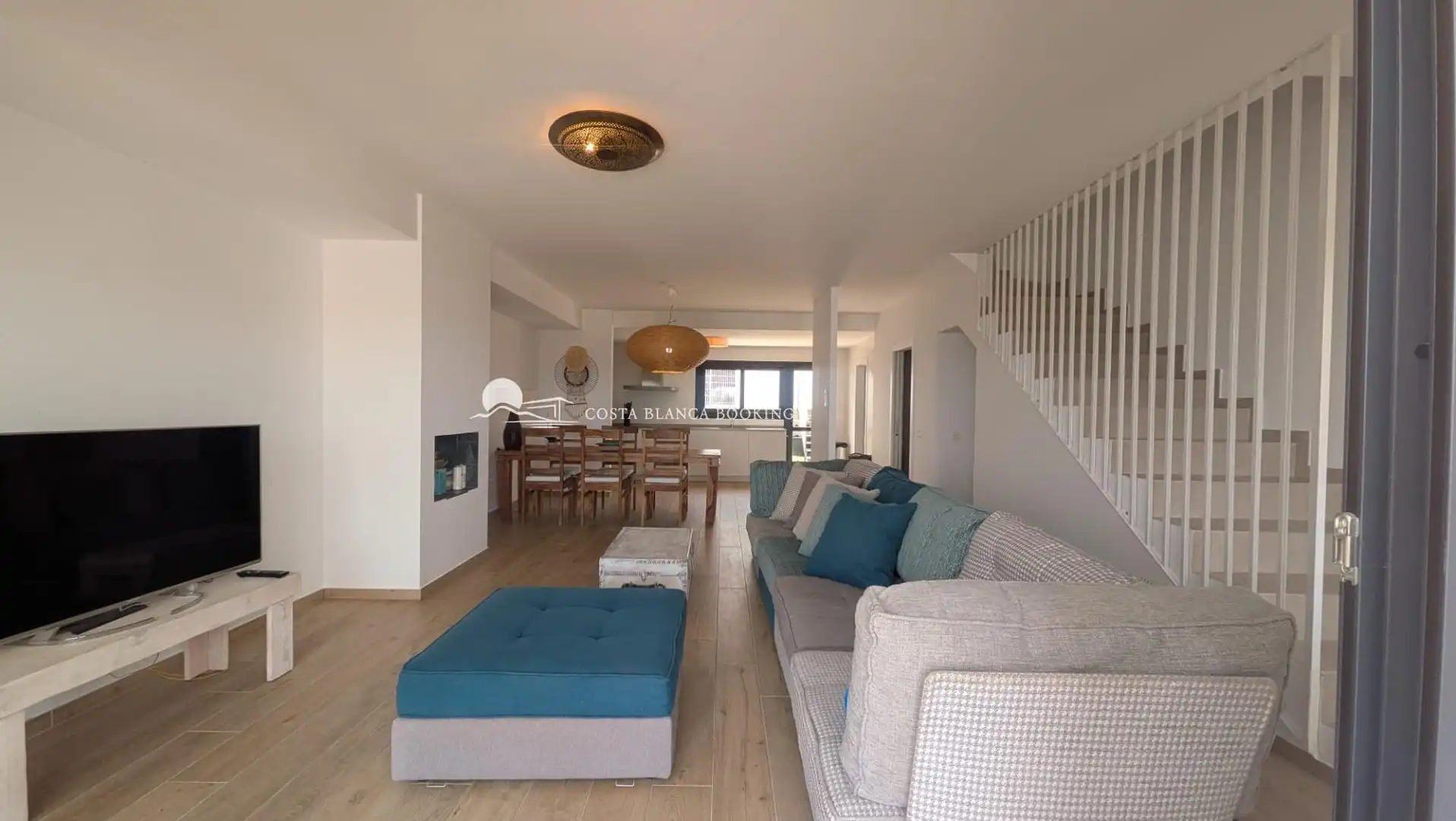 Sala d'estar de Casa adosada en venda en L'Alfàs del Pi amb Piscina comunitària