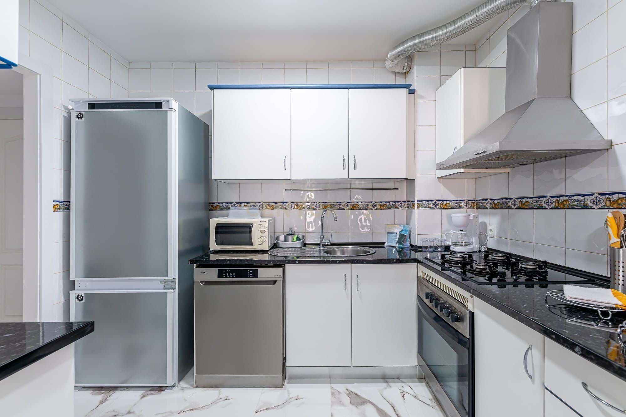 Kitchen of Flat to rent in Benalmádena  with Air Conditioner, Terrace and Furnished