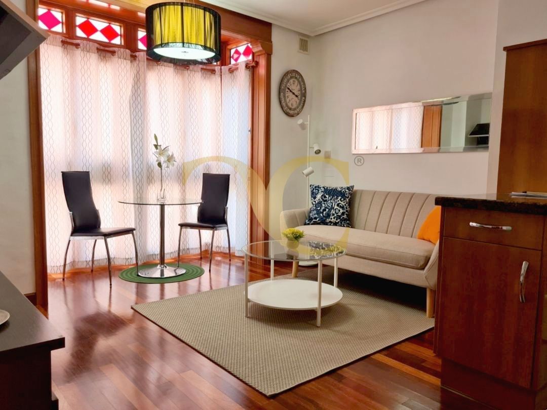 Living room of Apartment for sale in Gijón   with Heating, Furnished and Balcony