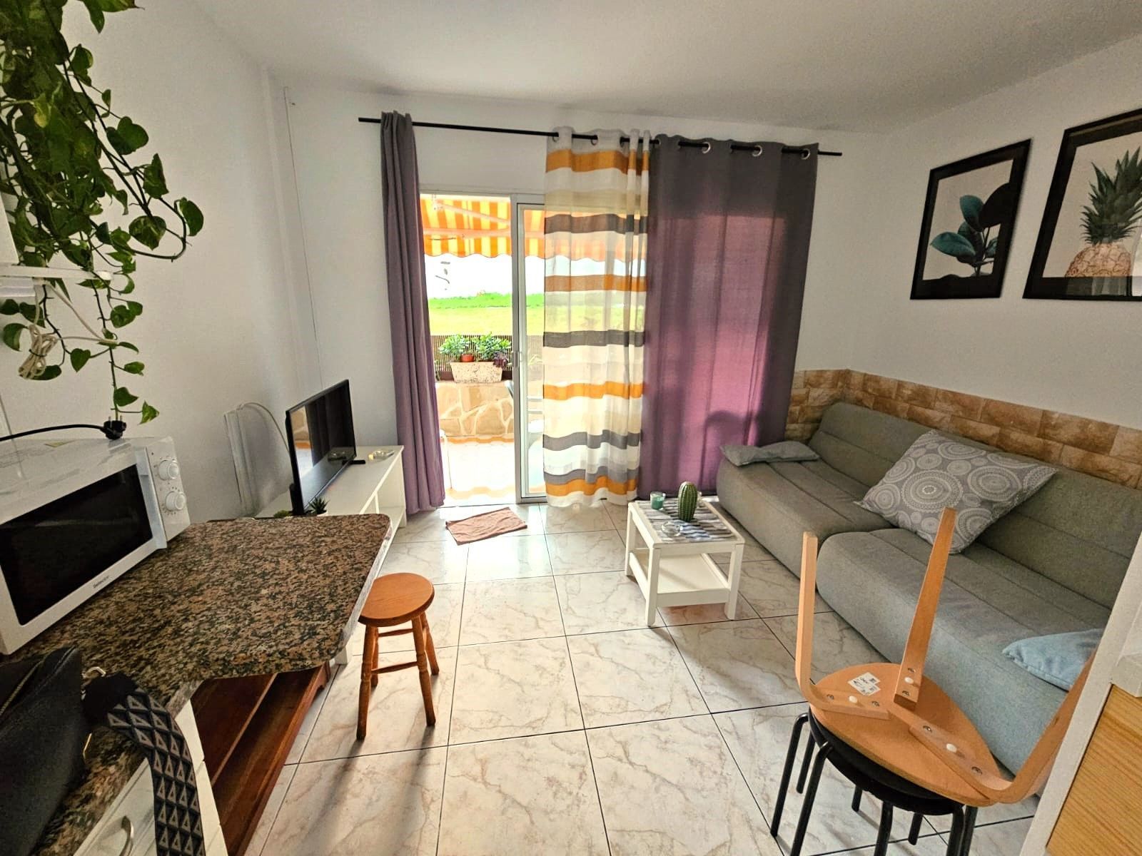 Sala de estar de Apartamento en venta en Puerto de la Cruz con Terraza y Amueblado
