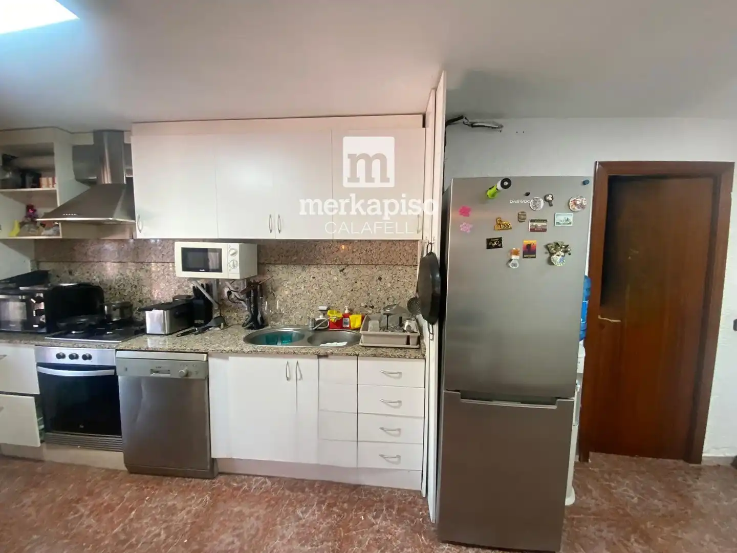 Cuina de Casa o xalet en venda en Cunit amb Jardí privat, Terrassa i Traster