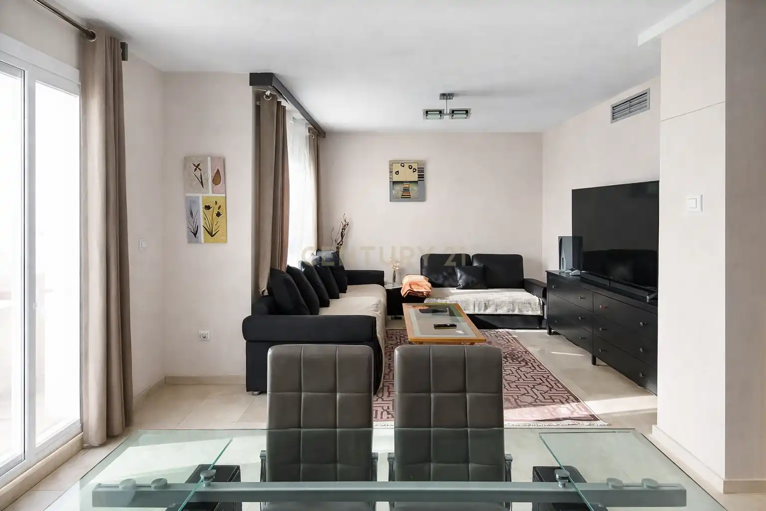 Sala de estar de Casa adosada en venta en La Nucia con Aire acondicionado, Trastero y Horno