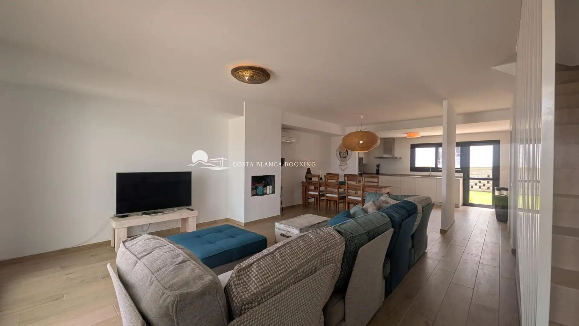 Sala d'estar de Casa adosada en venda en L'Alfàs del Pi amb Piscina comunitària