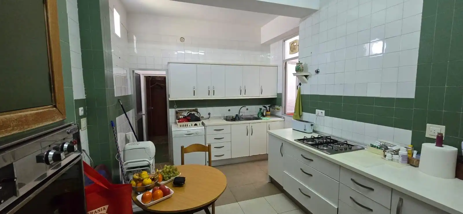 Kitchen of Flat for sale in Sevilla  with Air Conditioner, Terrace and Storage room