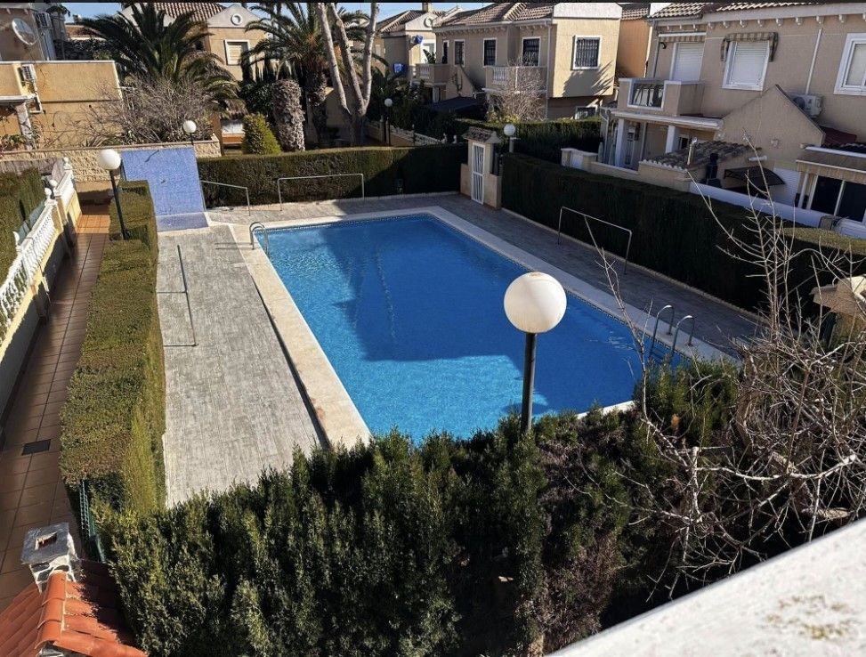 Swimming pool of Single-family semi-detached for sale in Torrevieja  with Air Conditioner, Terrace and Swimming Pool
