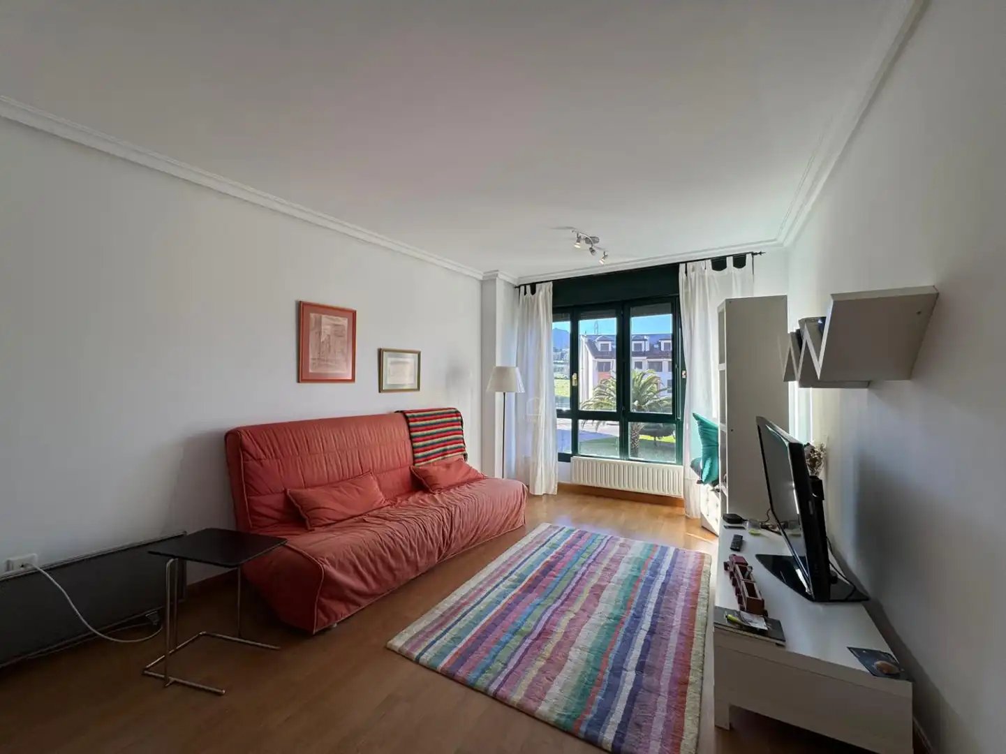 Sala de estar de Piso en venta en Parres con Calefacción, Jardín privado y Trastero