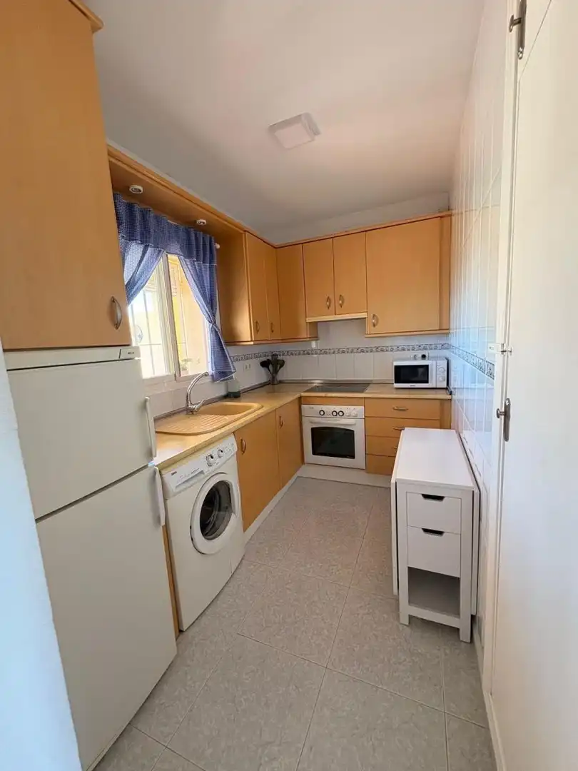 Cuina de Apartament de lloguer en Torrox amb Terrassa i Piscina comunitària