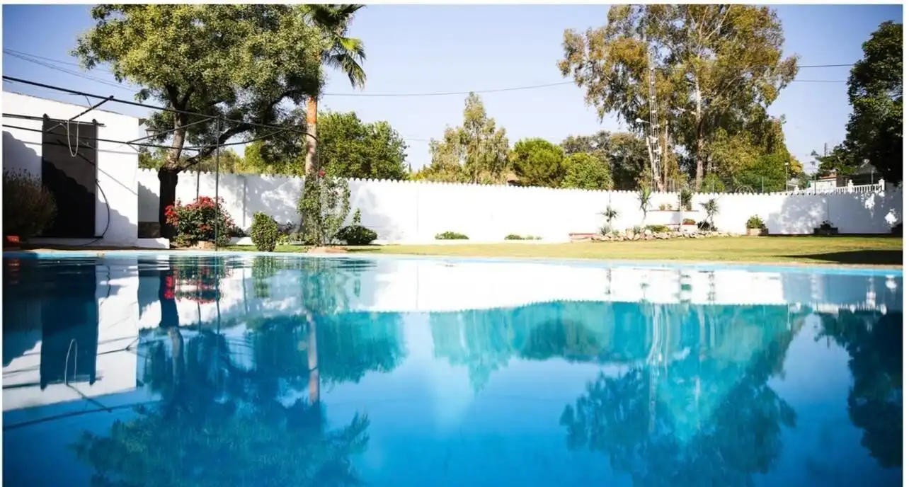 Piscina de Finca rústica en venta en El Castillo de las Guardas con Jardín privado, Terraza y Trastero