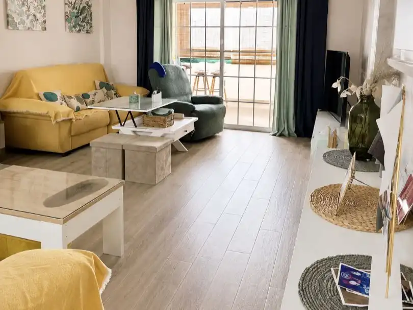 Sala de estar de Casa adosada en venta en Almuñécar con Aire acondicionado, Terraza y Balcón