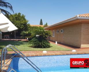 Jardí de Casa o xalet de lloguer en Picassent amb Aire condicionat, Terrassa i Piscina