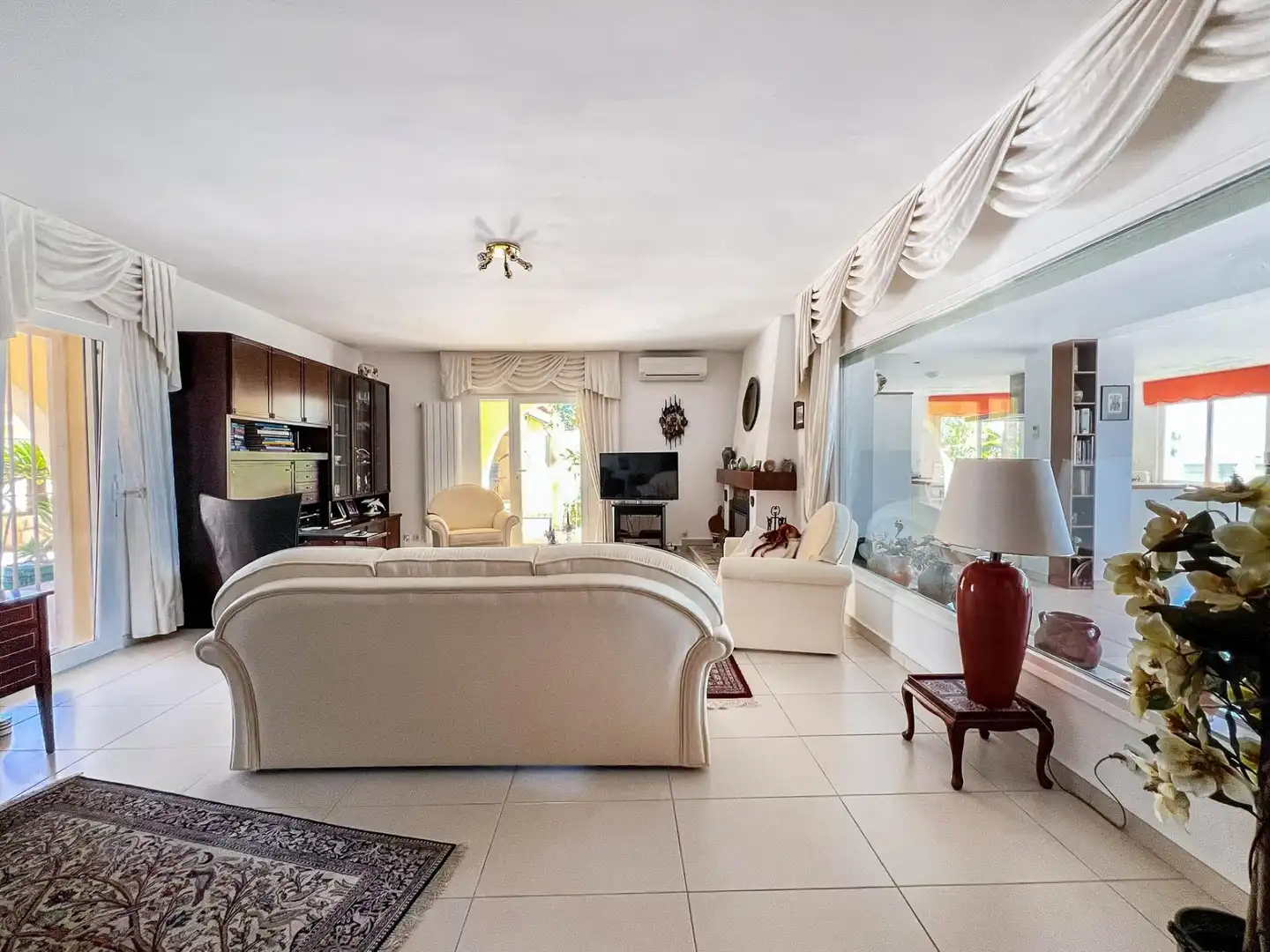 Sala de estar de Casa o chalet en venta en La Nucia con Aire acondicionado, Jardín privado y Piscina