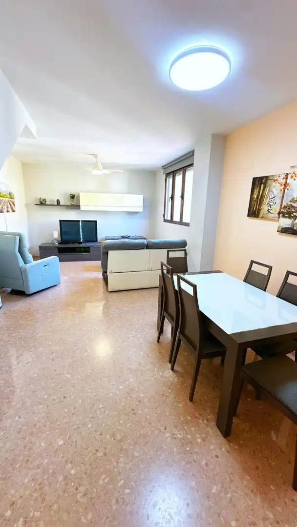 Sala de estar de Casa adosada en venta en Castelló de Rugat con Aire acondicionado, Calefacción y Jardín privado