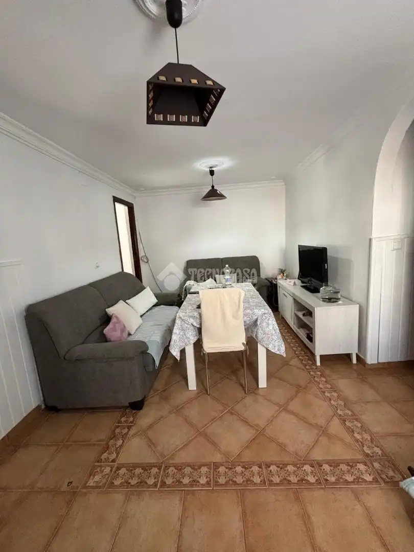 Sala de estar de Casa adosada en venta en Ayamonte con Aire acondicionado y Terraza