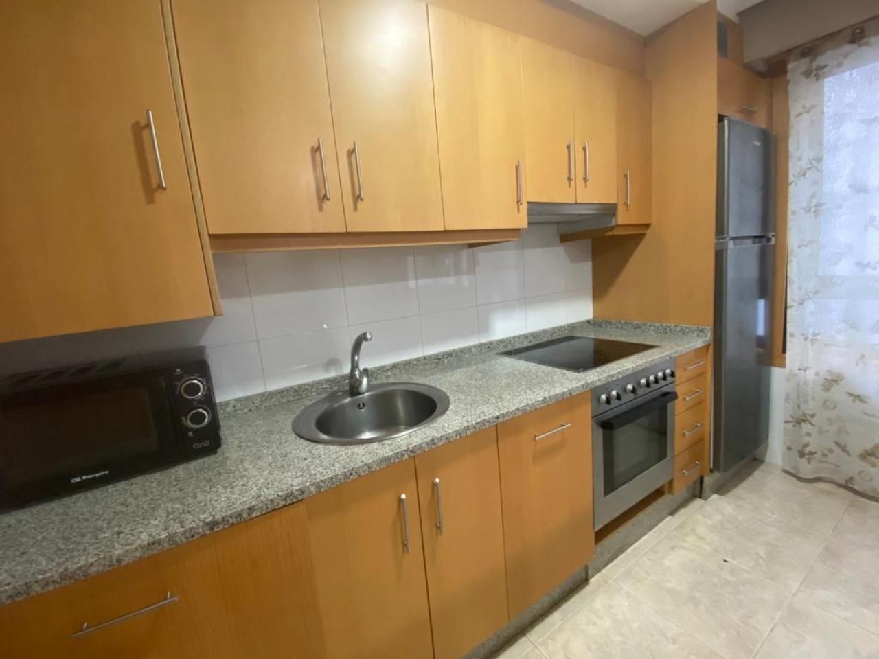 Kitchen of Apartment for sale in Ourense Capital   with Air Conditioner, Heating and Storage room