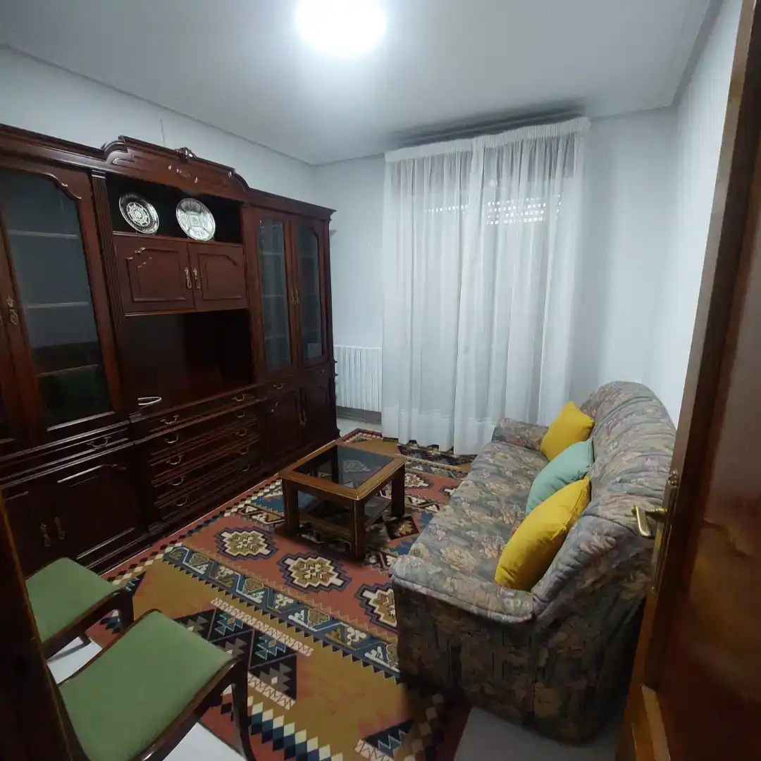 Sala d'estar de Casa adosada per a compartir en Universidad