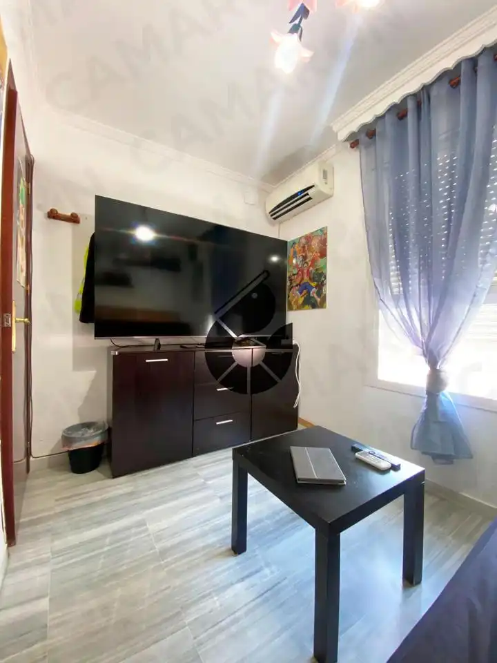 Sala de estar de Casa adosada en venta en Bormujos con Aire acondicionado, Terraza y Trastero