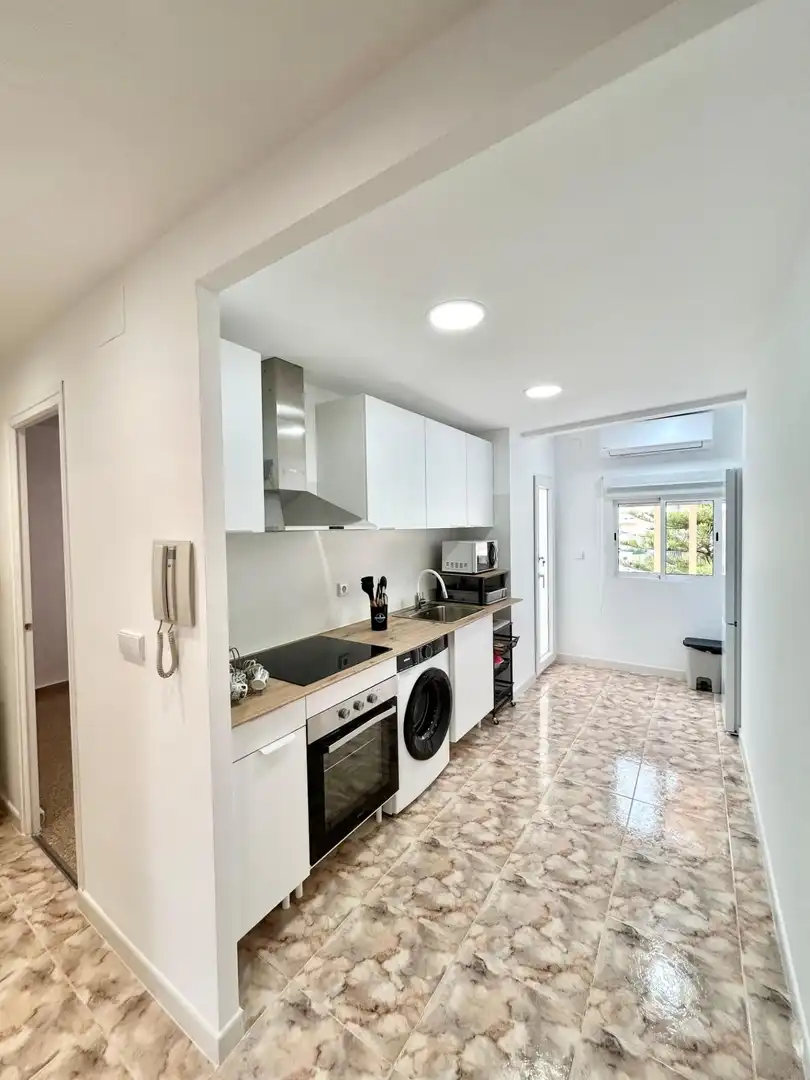 Cuina de Apartament de lloguer en La Pobla de Farnals amb Aire condicionat, Terrassa i Moblat
