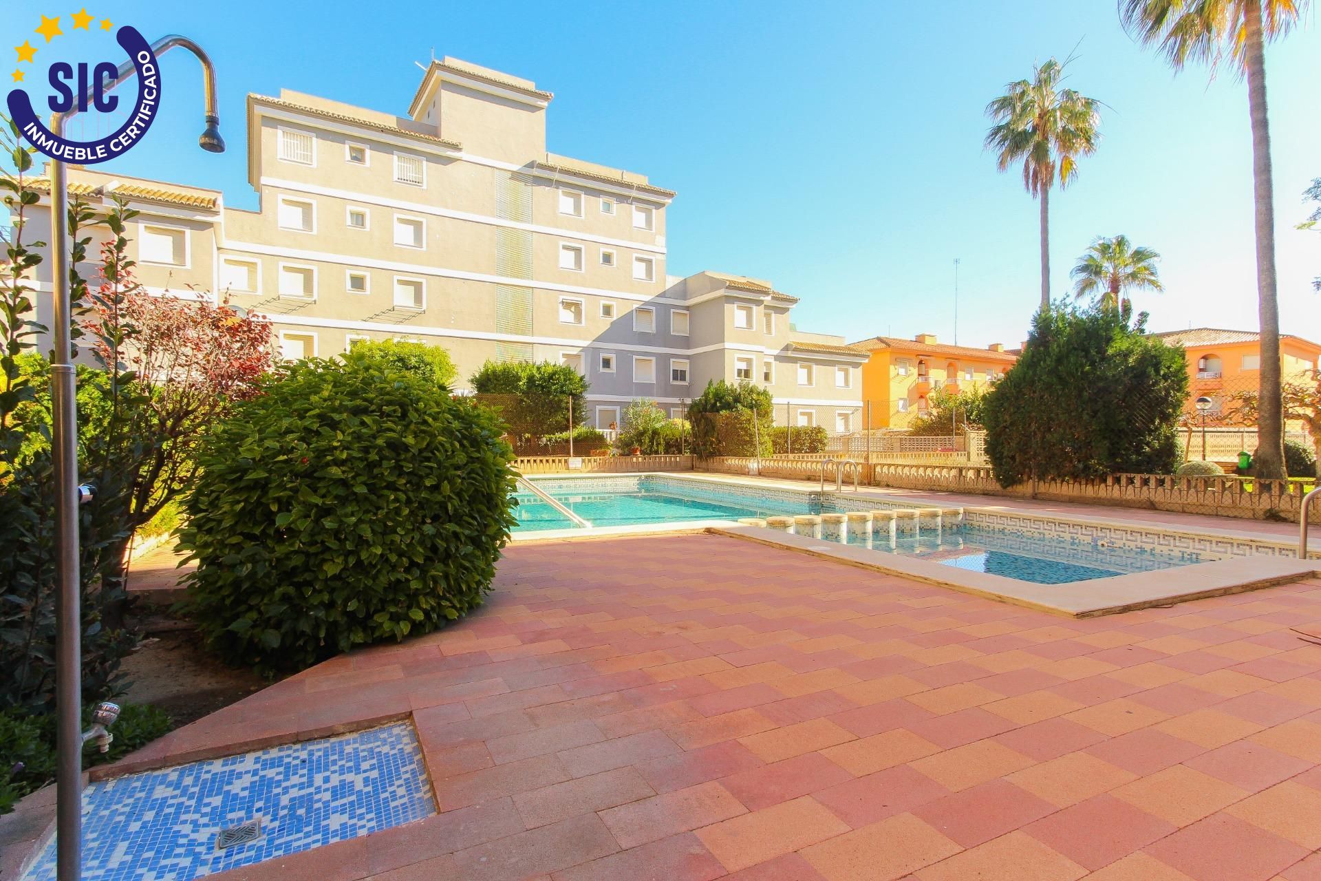 Piscina de Casa adosada en venda en Sueca amb Jardí privat, Terrassa i Piscina comunitària