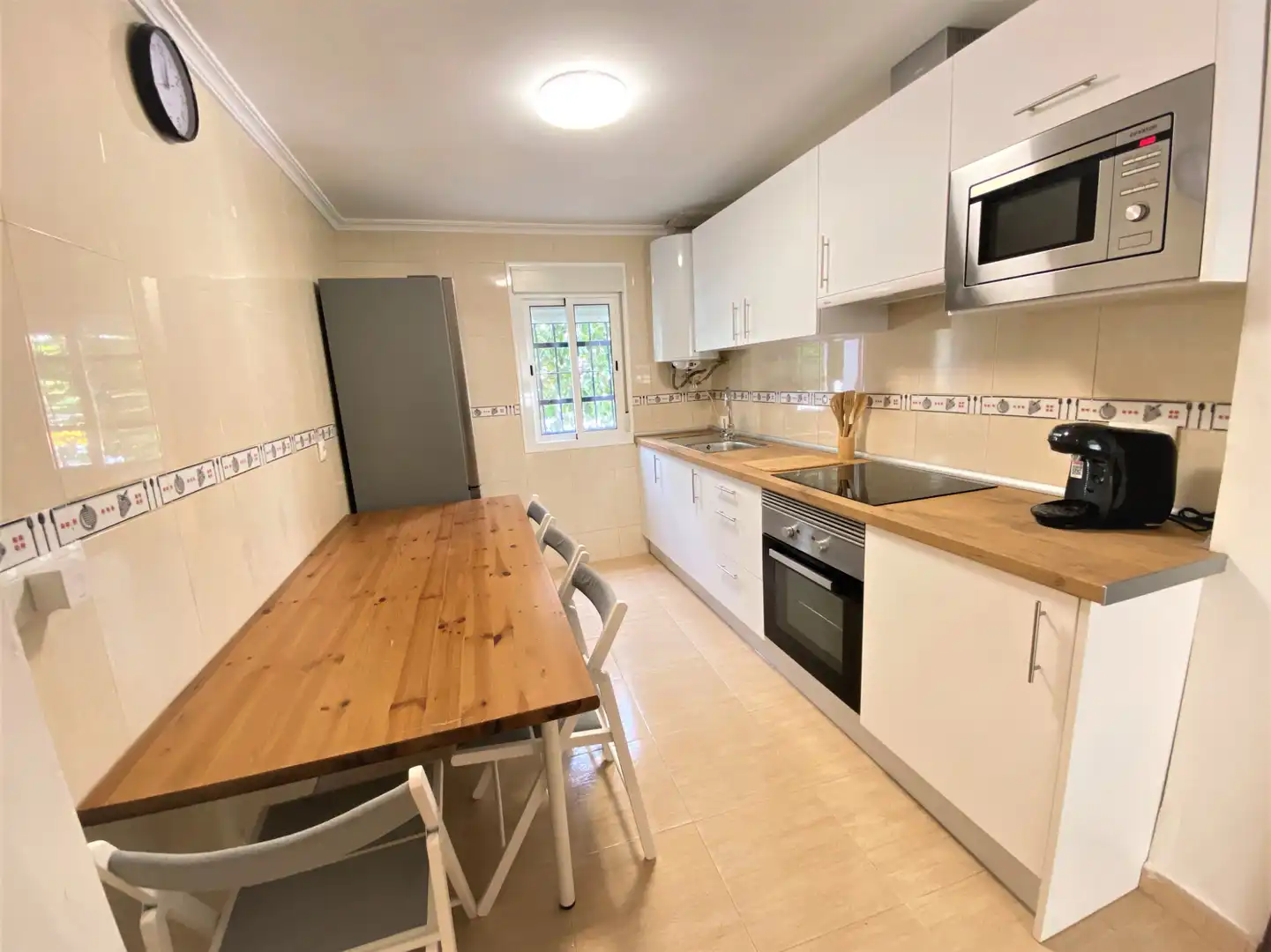 Kitchen of Flat for share in Sevilla  with Air Conditioner, Heating and Furnished