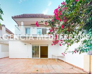 Exterior view of Single-family semi-detached for sale in Paterna  with Air Conditioner, Heating and Private garden