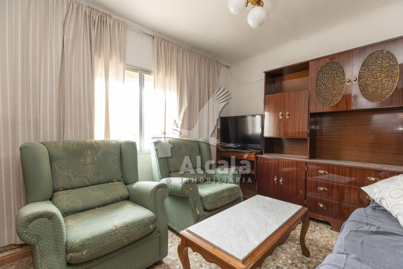 Sala de estar de Casa adosada en venta en Meco con Jardín privado
