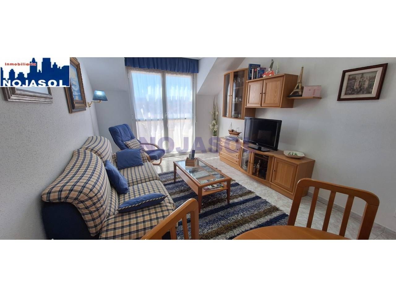 Sala d'estar de Apartament en venda en Noja amb Calefacció, Terrassa i Moblat
