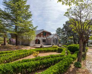 Vista exterior de Casa o xalet en venda en Guadarrama amb Aire condicionat, Calefacció i Jardí privat