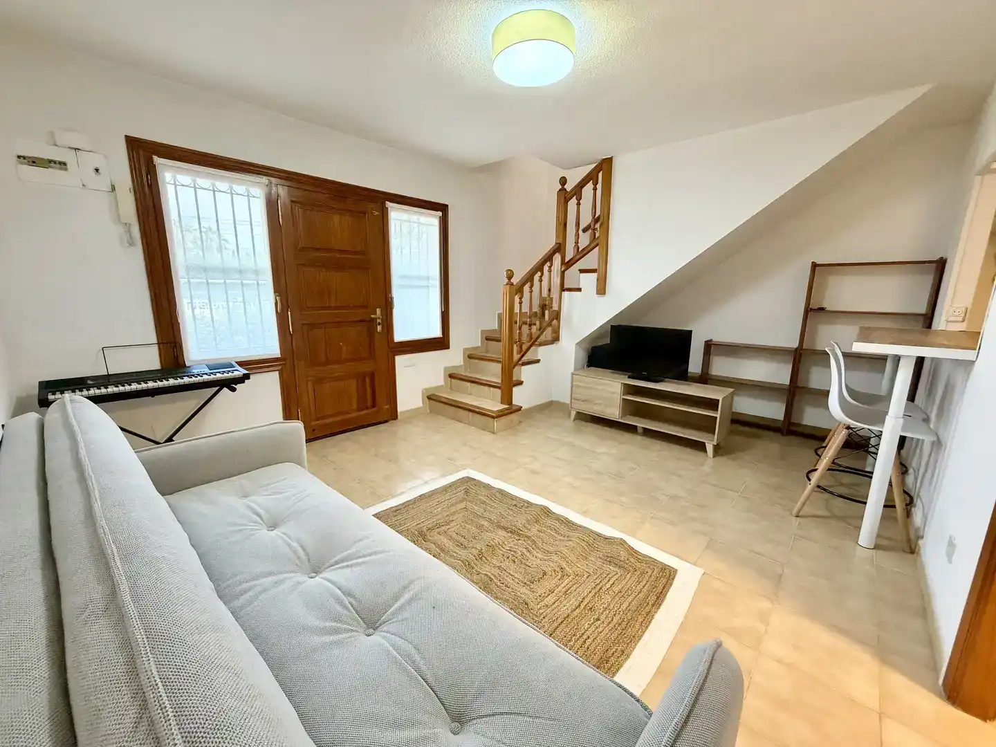 Sala d'estar de Casa adosada en venda en Sant Joan d'Alacant amb Piscina i Balcó