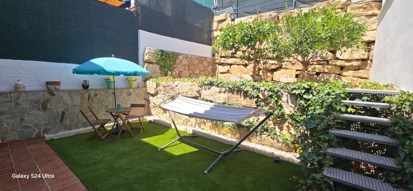 Terrassa de Casa adosada en venda en Torremolinos amb Aire condicionat, Calefacció i Jardí privat