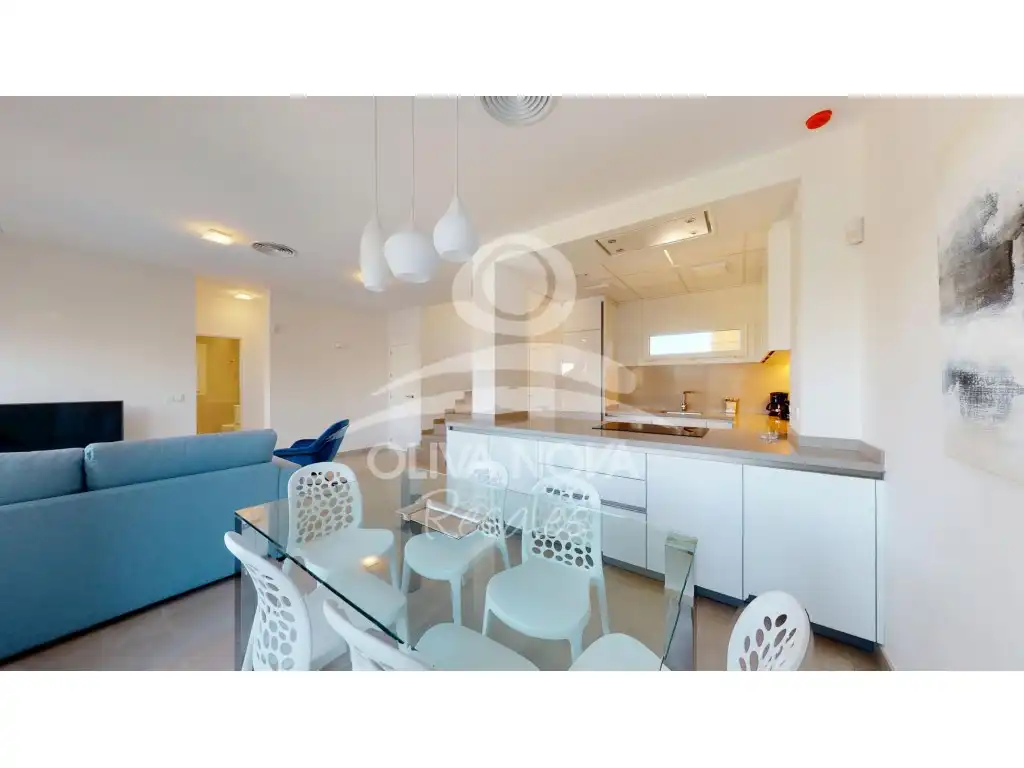 Cuina de Apartament en venda en Oliva amb Aire condicionat, Jardí privat i Terrassa