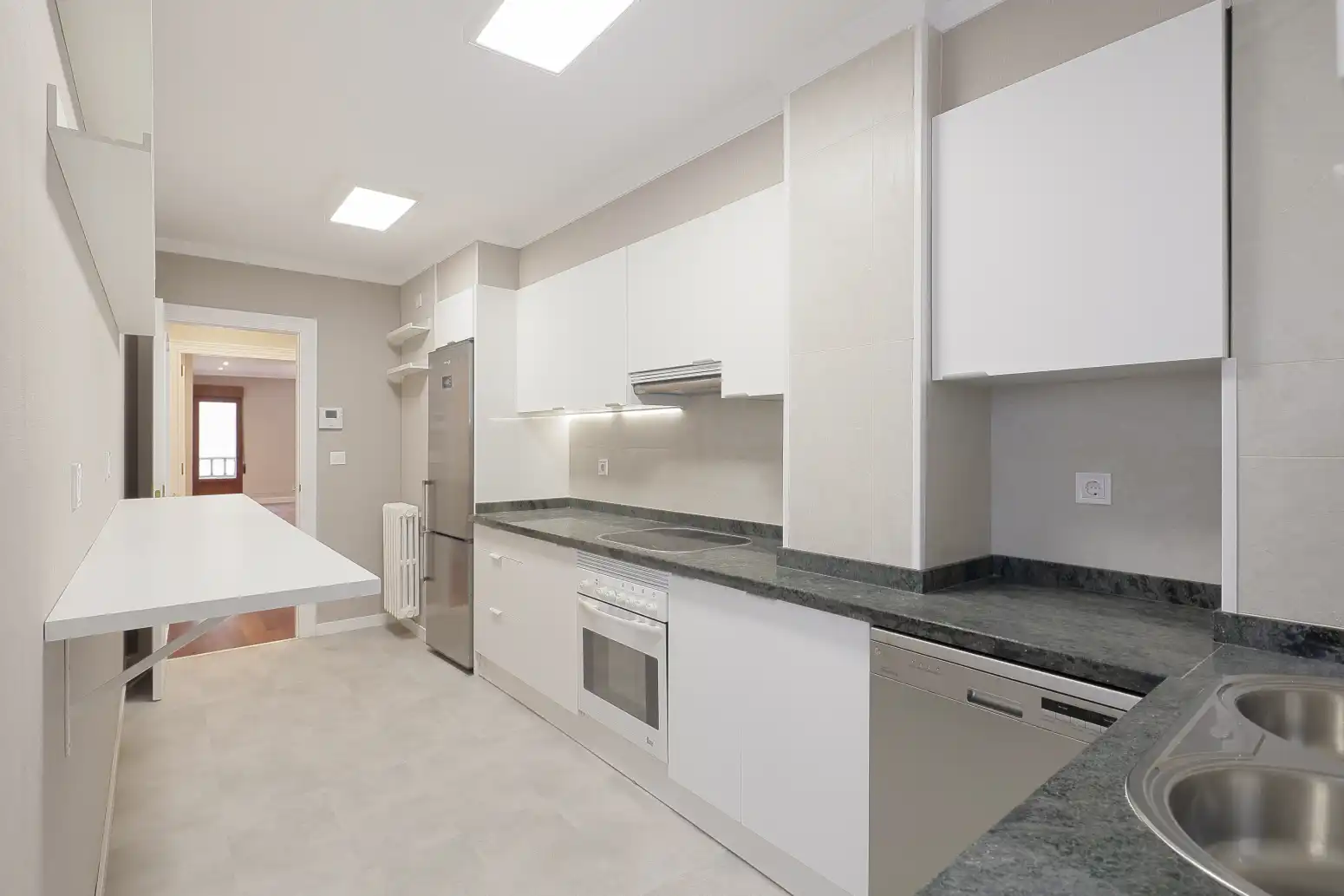 Kitchen of Flat for sale in Gijón   with Heating, Parquet flooring and Storage room