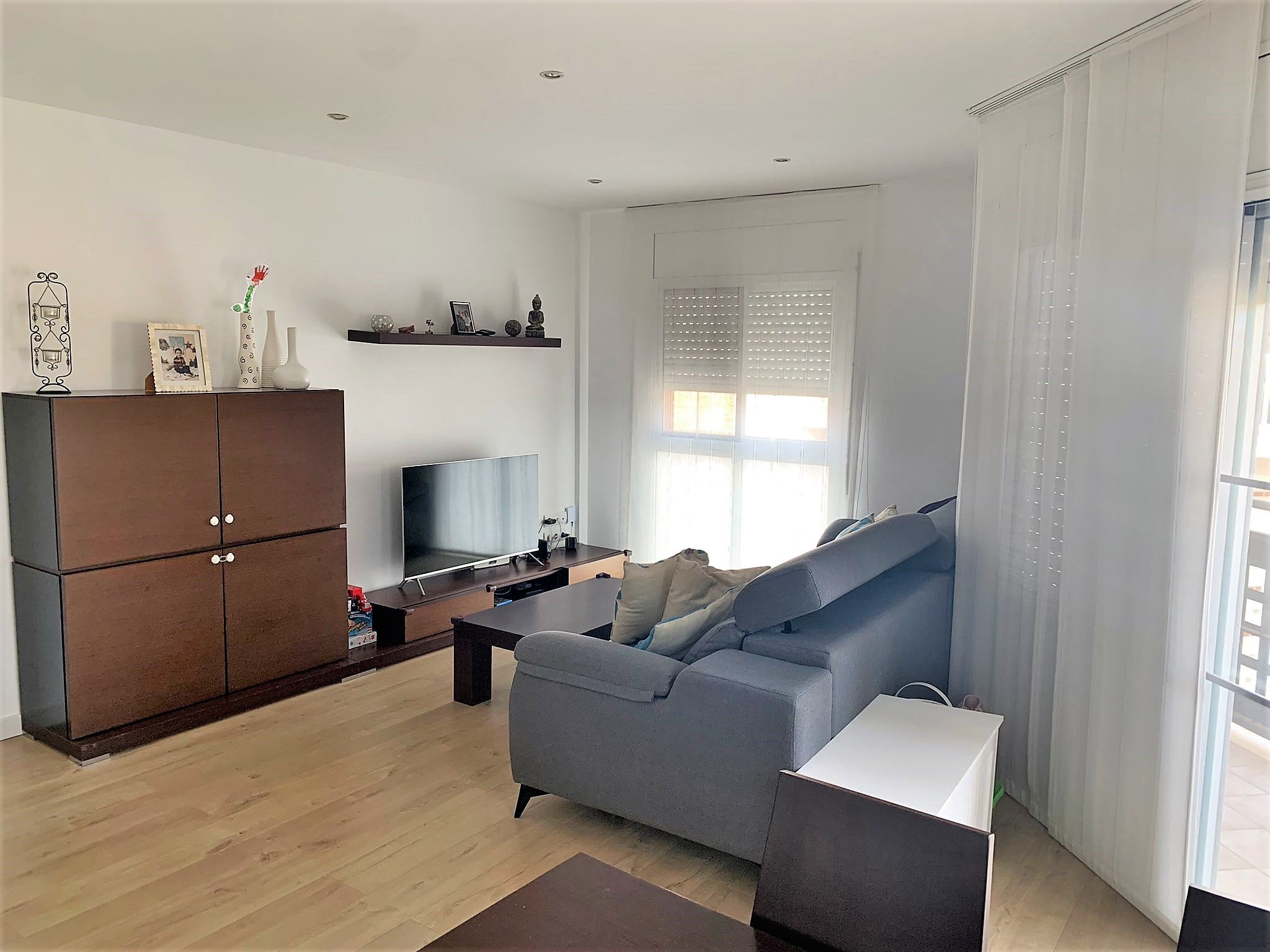 Living room of Single-family semi-detached for sale in Camarles  with Air Conditioner, Terrace and Storage room