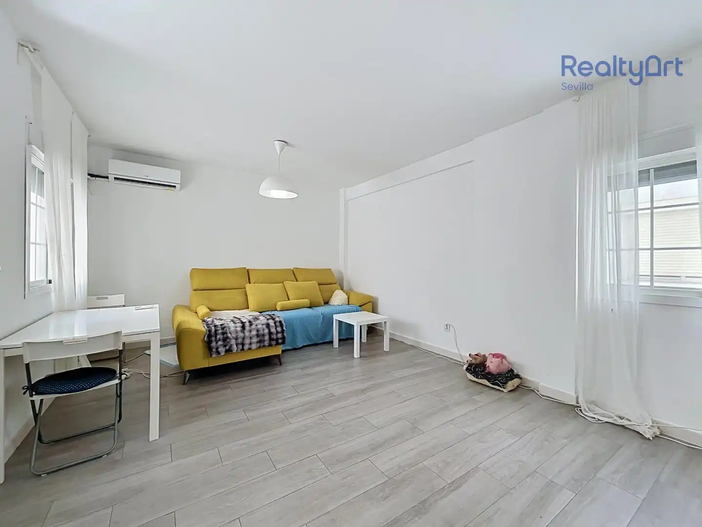 Sala de estar de Piso en venta en Sevilla con Aire acondicionado, Calefacción y Terraza