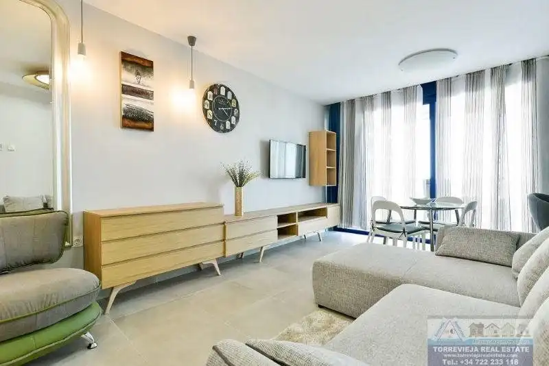 Sala de estar de Apartamento en venta en Torrevieja con Aire acondicionado, Terraza y Piscina
